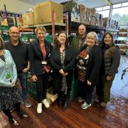 Foodbank volunteers and Red Funnel staff after the donartion