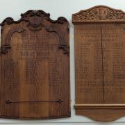 The memorial boards at Carisbrooke College, now located in the school hall