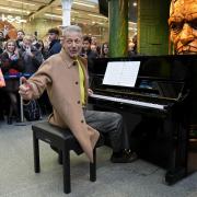 Jeff Goldblum gives a surprise piano performance to travellers at St Pancras International station in London (Lucy North/PA)