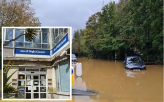 Floodwater in Newport last week. Inset: County Hall.