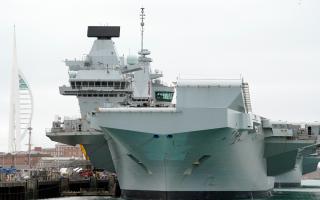 The Royal Navy aircraft carrier HMS Queen Elizabeth alongside at HMNB Portsmouth. The departure of HMS Queen Elizabeth to lead the largest Nato exercise since the Cold War has been cancelled at the last minute