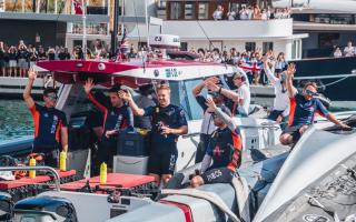 The INEOS Britannia team and British fans celebrate an excellent day in the America's Cup in Barcelona.