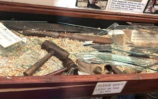 A wrecked display cabinet at the Longshoreman's Museum was targeted by burglars.