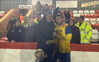 Newport's man of the match, Brad Young, picking up his award on behalf of sponsor Paul Guy.