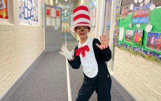 A student at Cheam Common Junior Academy in Surrey dressed as The Cat in the Hat (PA)